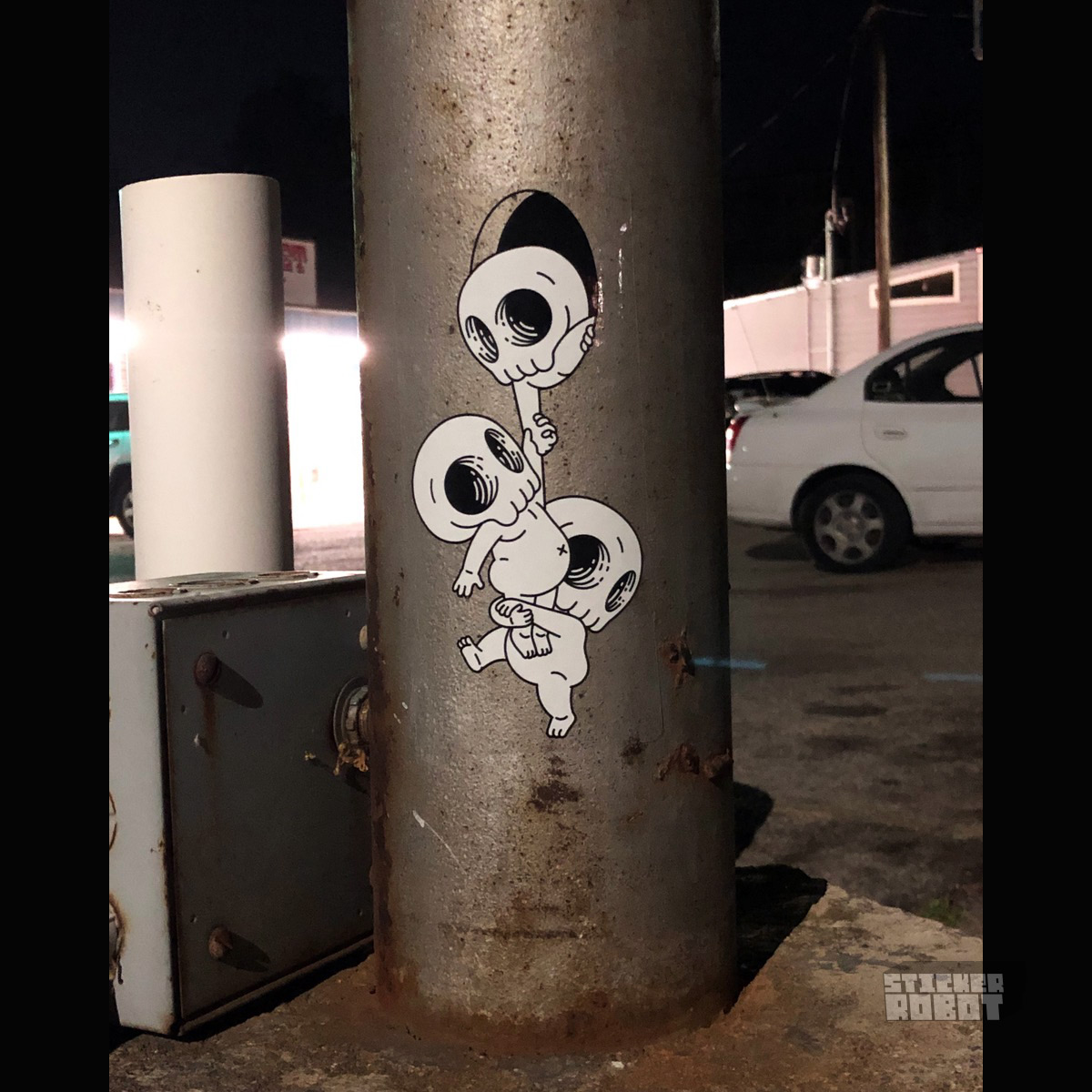 Mike_Mitchell_Clear_Sticker_Skull_kids-on-pole