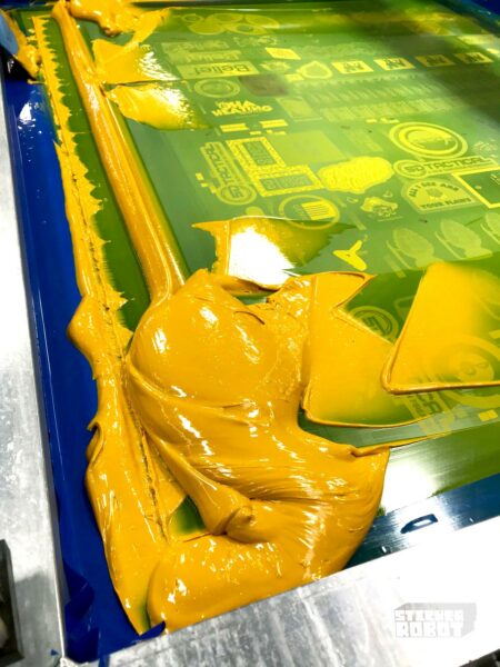 Thick silkscreen ink layered on vinyl sticker surface