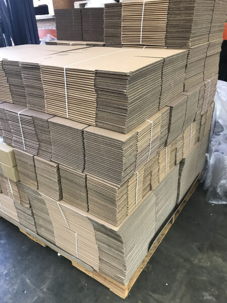 silkscreen-stickers-boxes Stacks o cardboard boxes