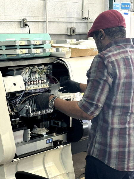 silkscreen-stickers-jeremy-fixing Our UV sticker printer gets an overhaul